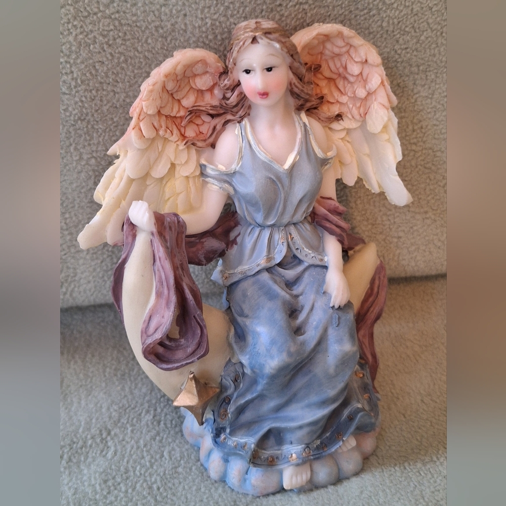 Blue and Cream Ceramic Angel Sculpture